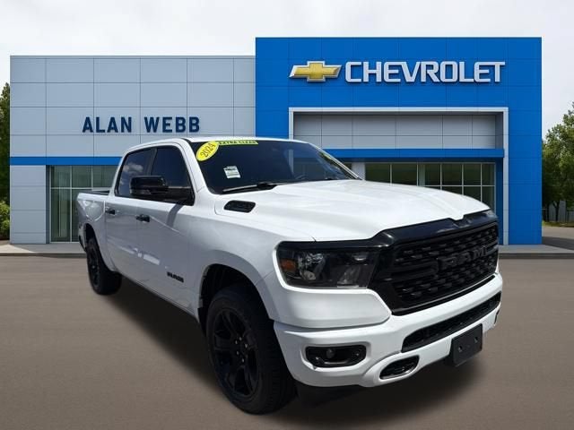 2024 RAM 1500 Big Horn Crew Cab 4x4 5'7" Box in White — front three-quarter view