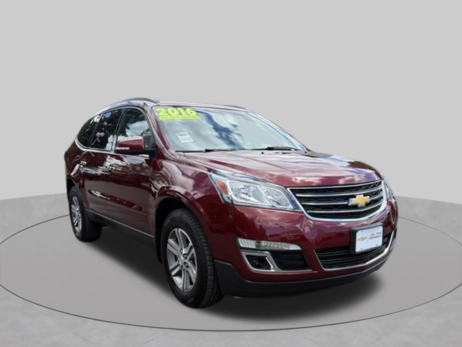 2016 Chevrolet Traverse LT in Siren Red Tintcoat — front three-quarter view