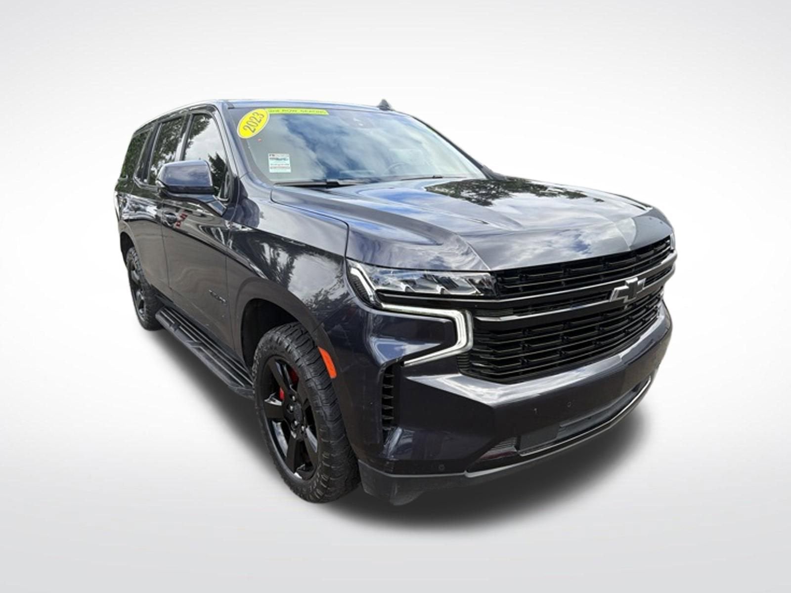 2023 Chevrolet Tahoe RST in Dark Ash Metallic — front three-quarter view
