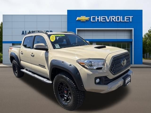 2018 Toyota Tacoma TRD Sport in Beige — front three-quarter view