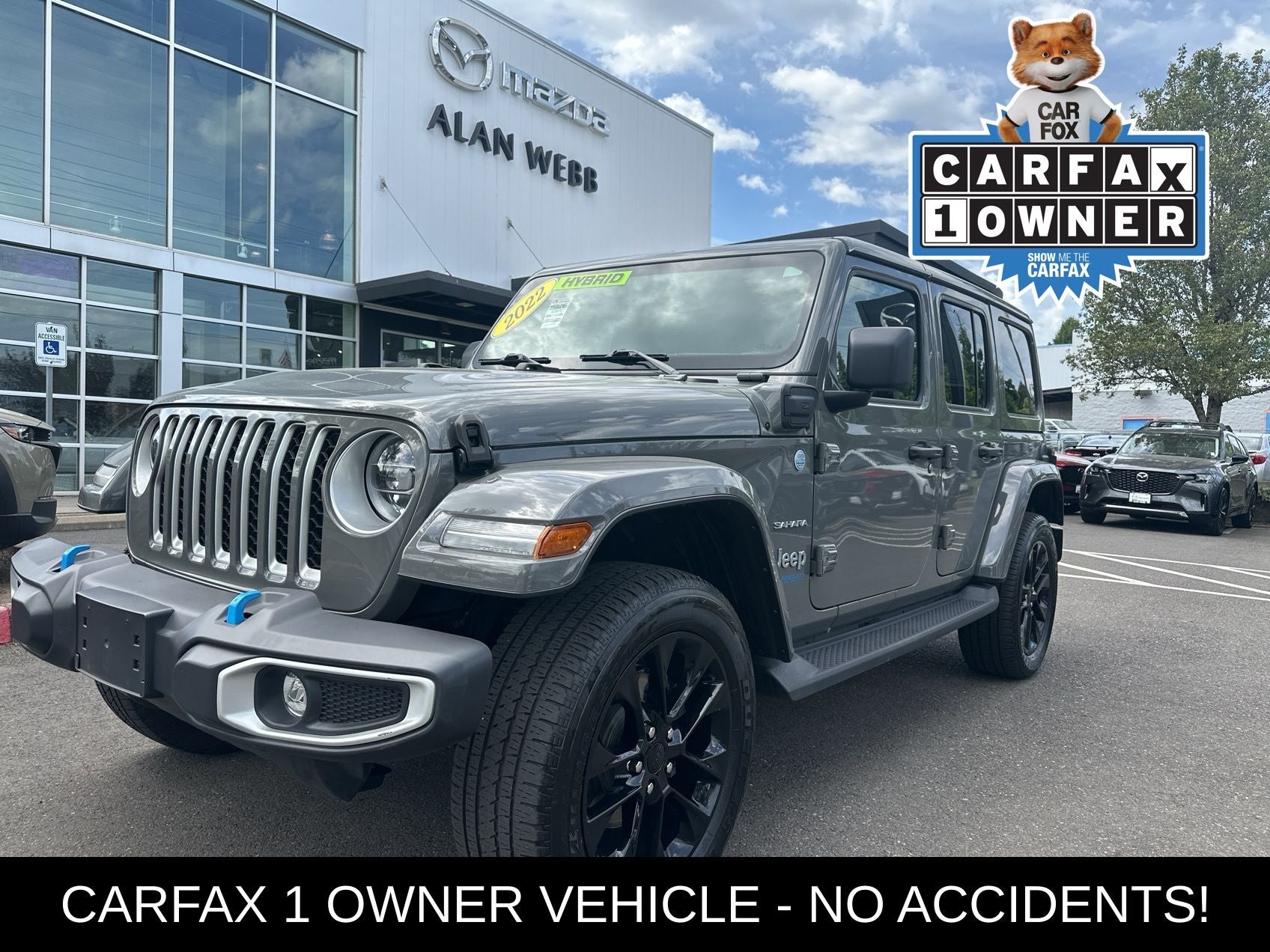 2022 Jeep Wrangler Unlimited Sahara 4xe in Sting-Gray Clearcoat — front three-quarter view
