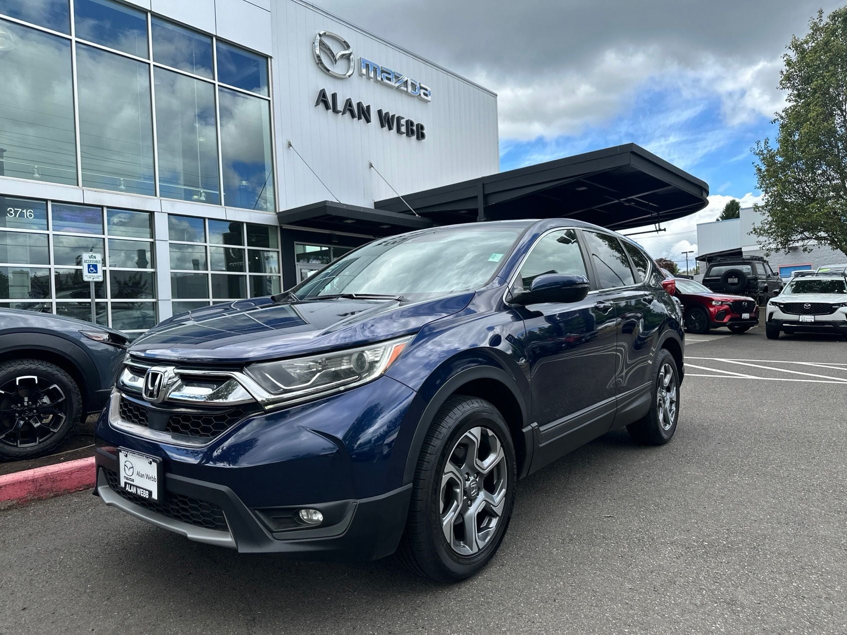 2019 Honda CR-V EX-L in Blue — front three-quarter view