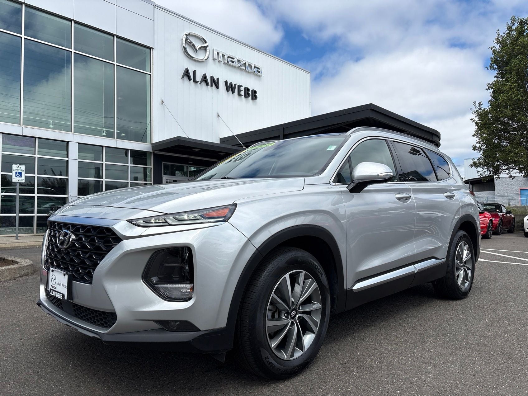 2019 Hyundai Santa Fe Ultimate in Symphony Silver — front three-quarter view