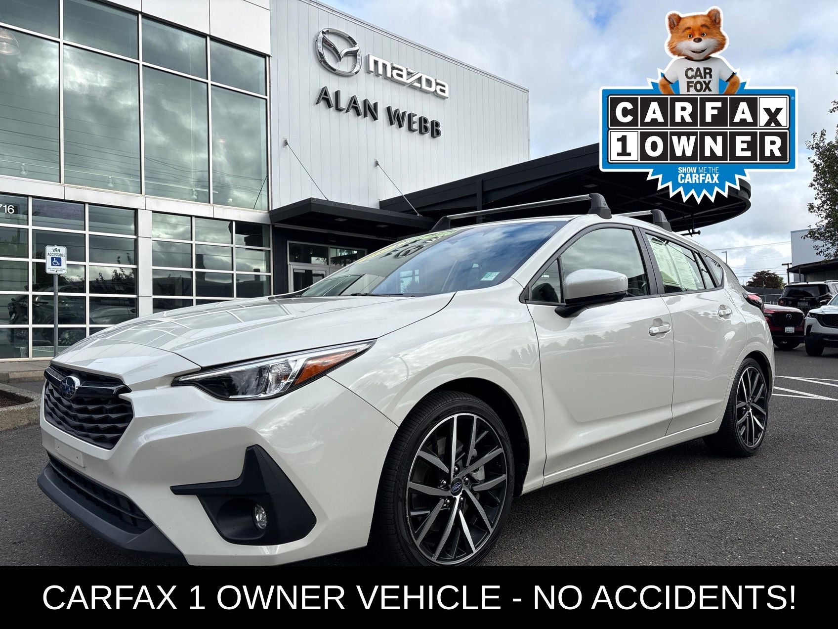 2024 Subaru Impreza Sport in Crystal White Pearl — front three-quarter view