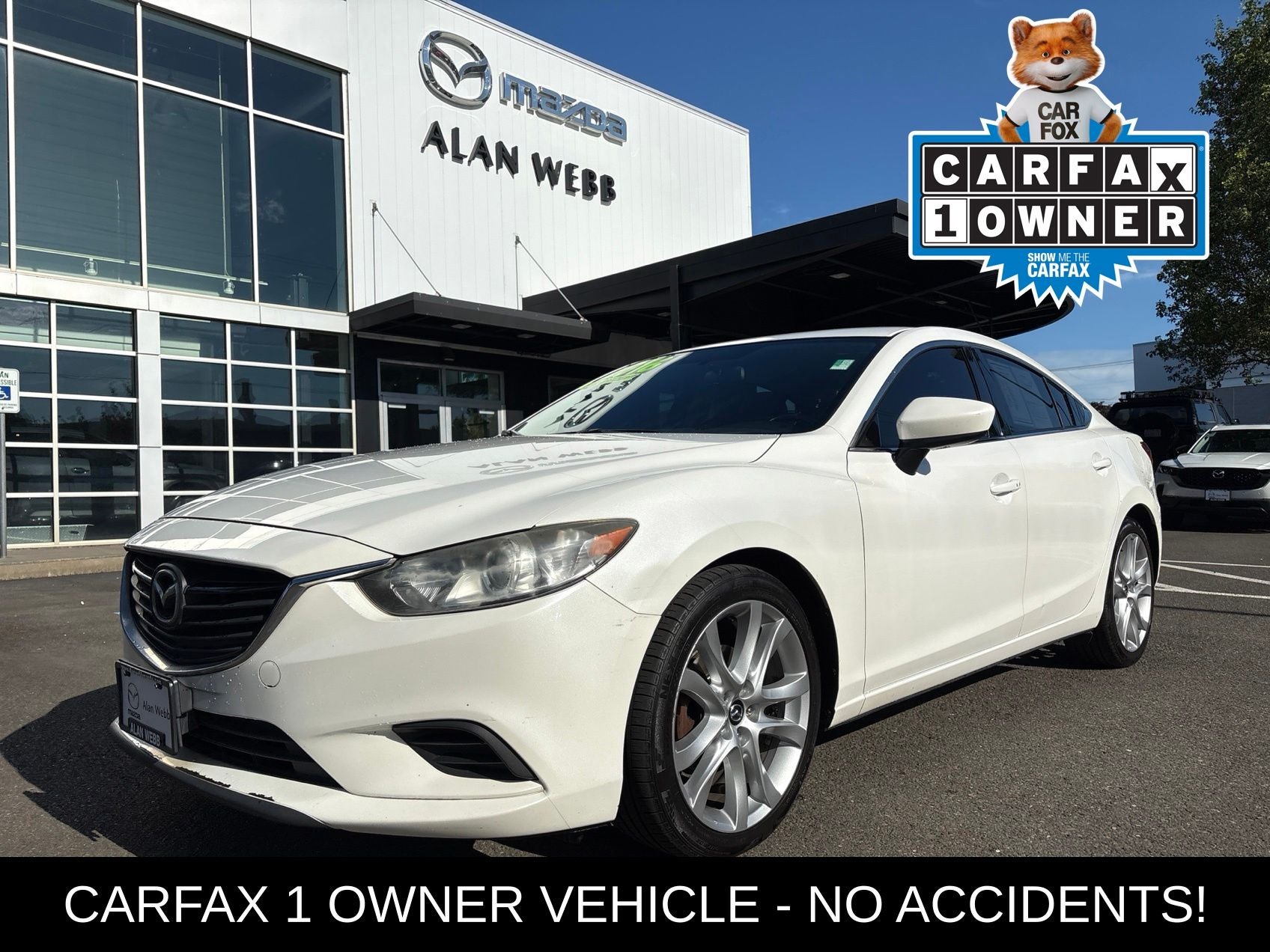2016 Mazda Mazda6 i Touring in Snowflake White Pearl — front three-quarter view