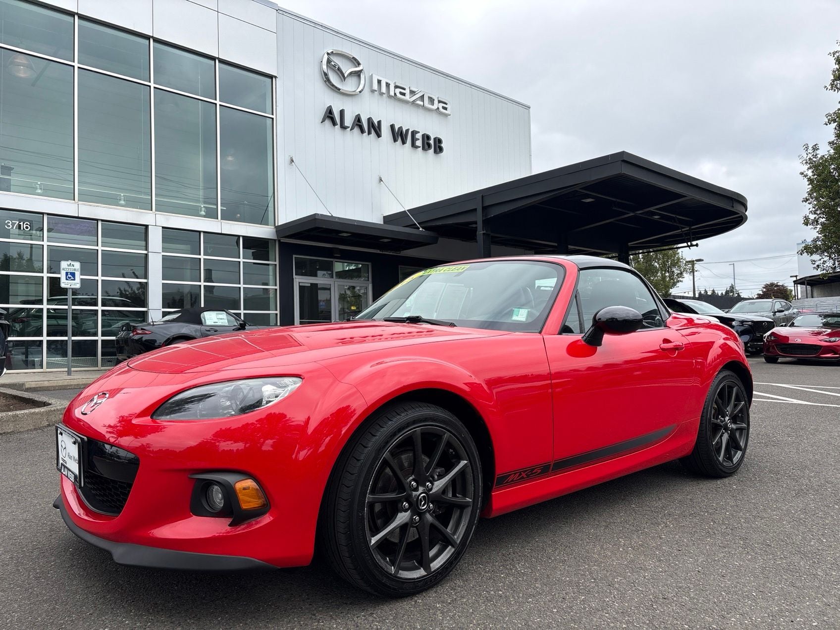 2015 Mazda Mazda Miata Club in True Red — front three-quarter view