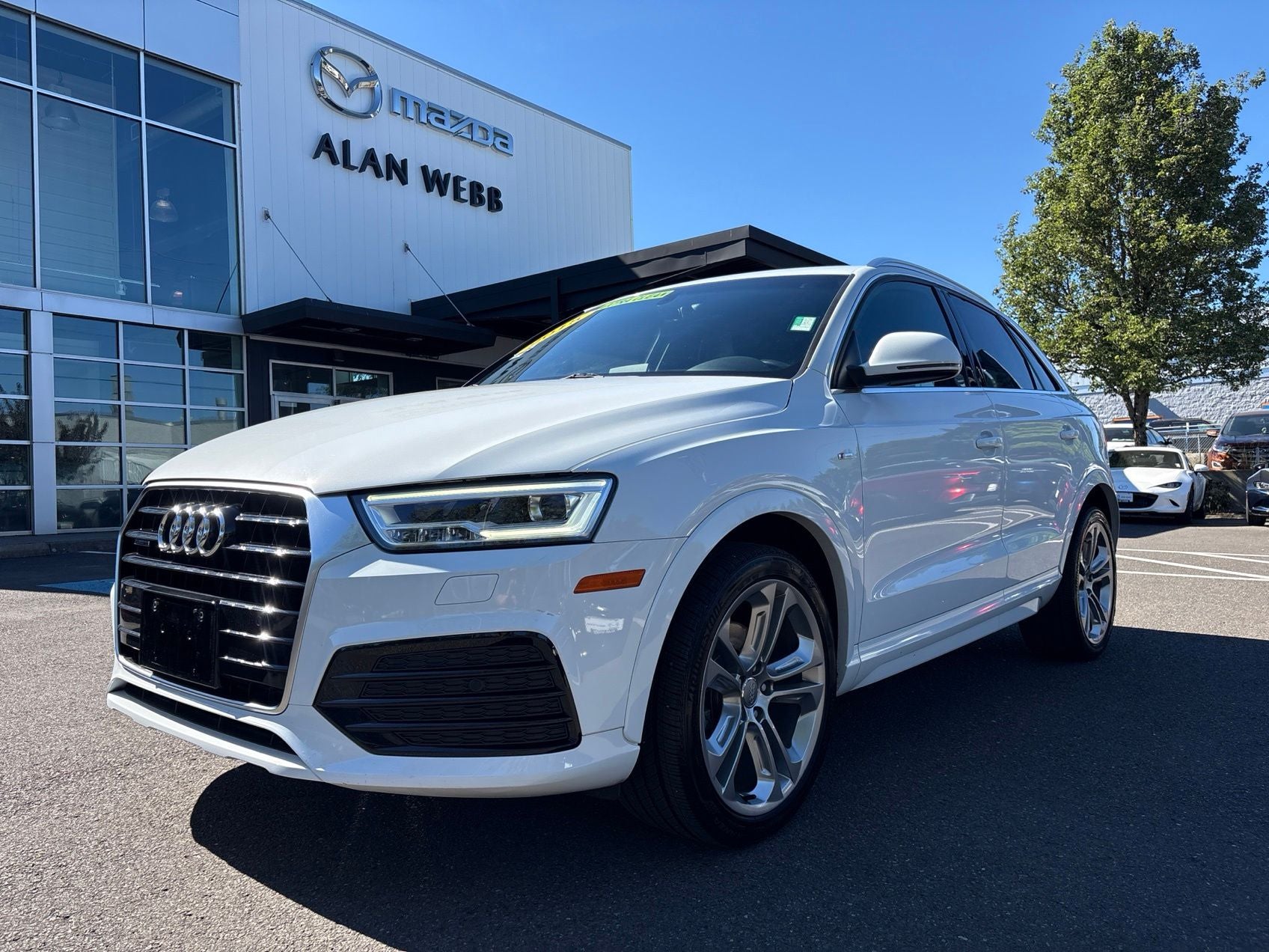 2018 Audi Q3 2.0T Premium Plus quattro in Glacier White — front three-quarter view