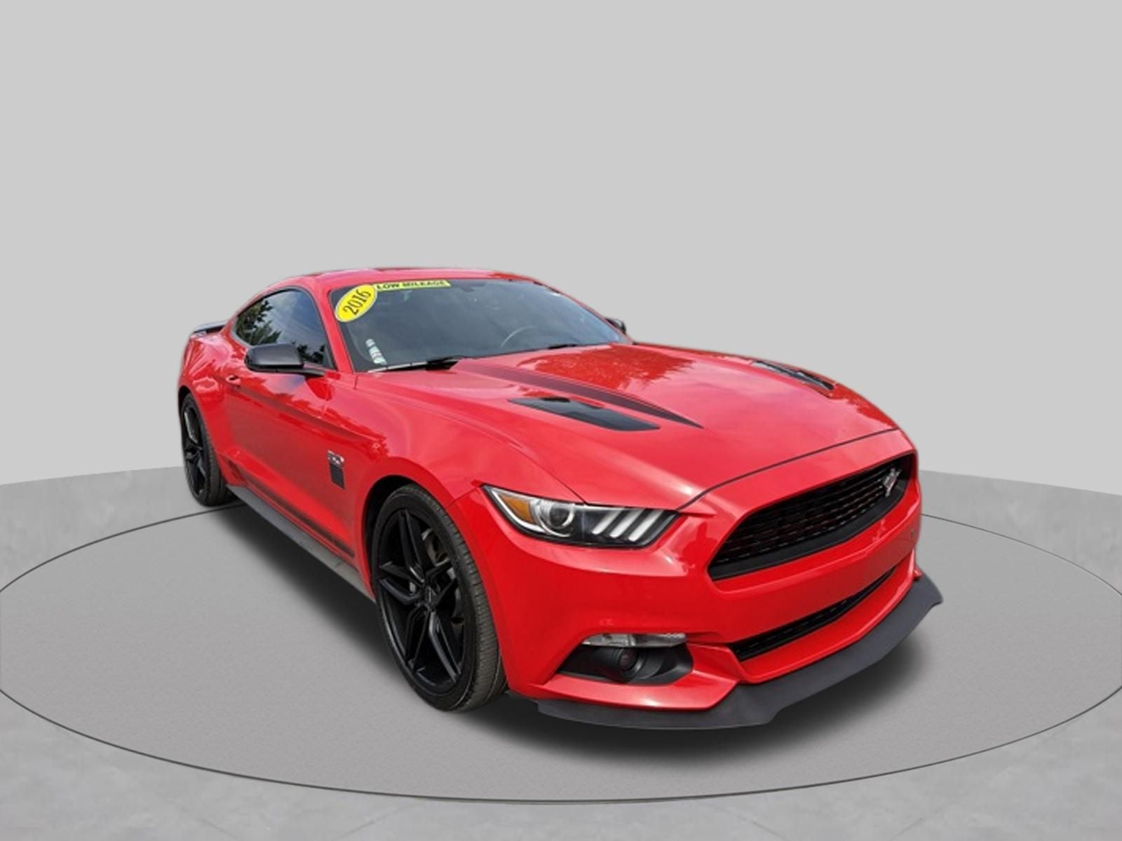 2016 Ford Mustang GT Premium in Race Red — front three-quarter view