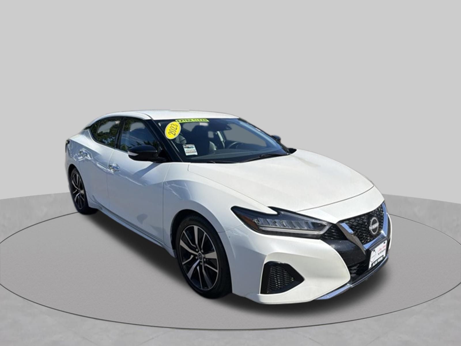 2023 Nissan Maxima SV in Pearl White Tricoat — front three-quarter view