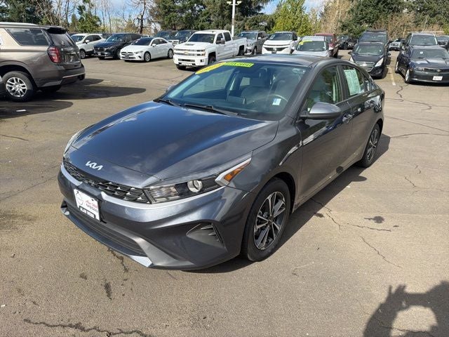2023 Kia Forte LXS in Gravity Gray — front three-quarter view
