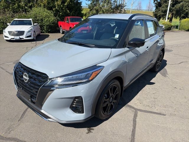 2024 Nissan Kicks SR CPO in Boulder Gray Pearl — front three-quarter view