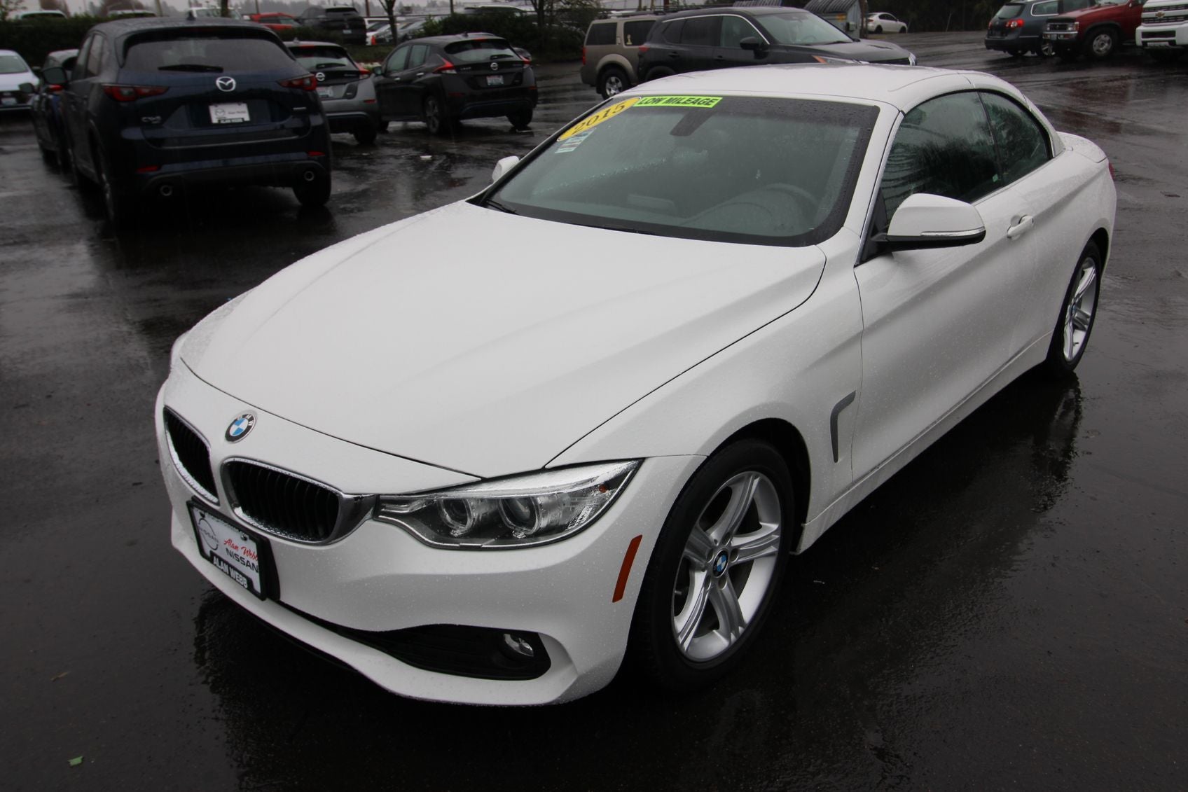 2015 BMW 4 Series 428i in Alpine White — front three-quarter view