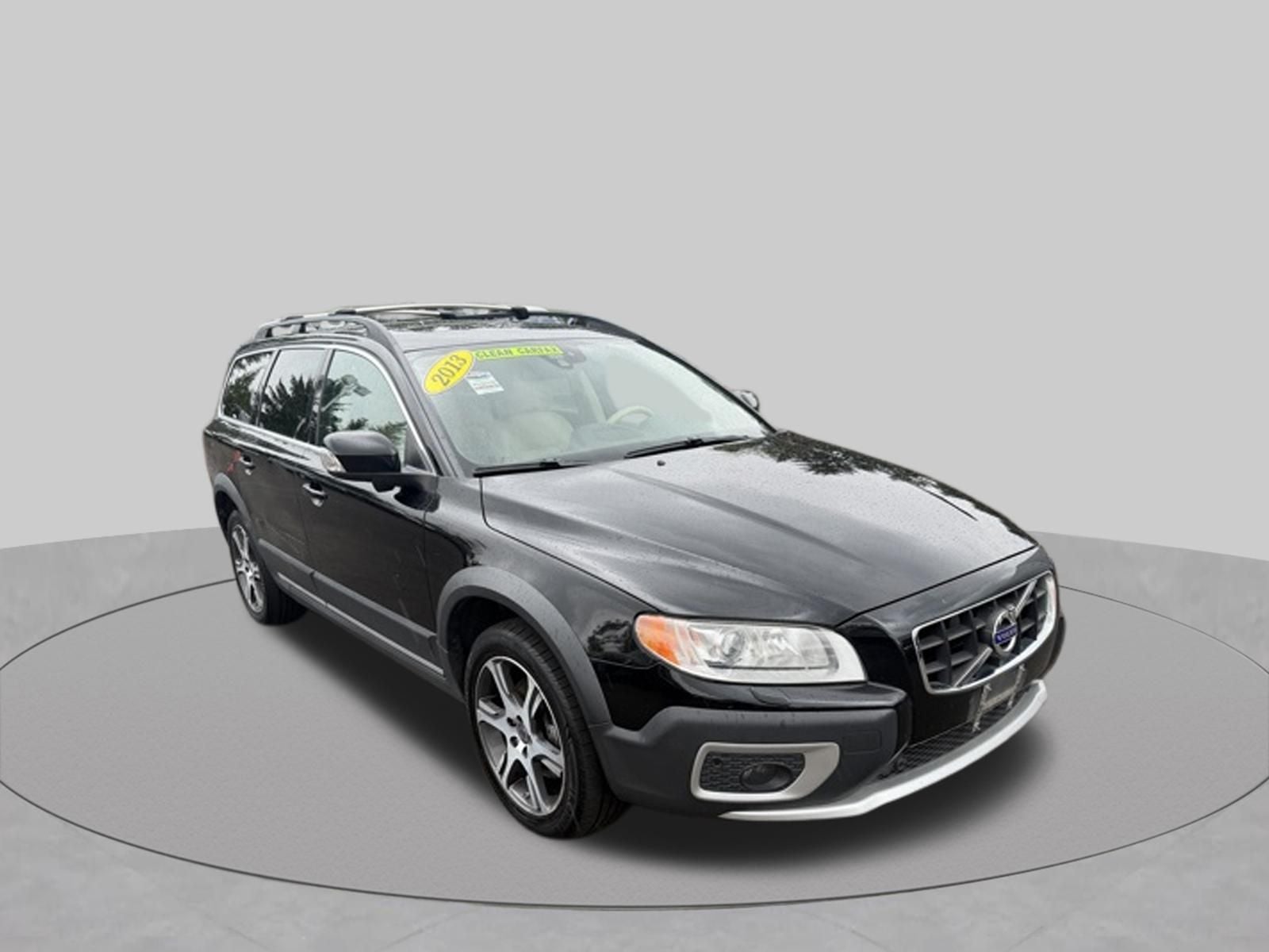 2013 Volvo XC70 T6 in Black / Stone — front three-quarter view