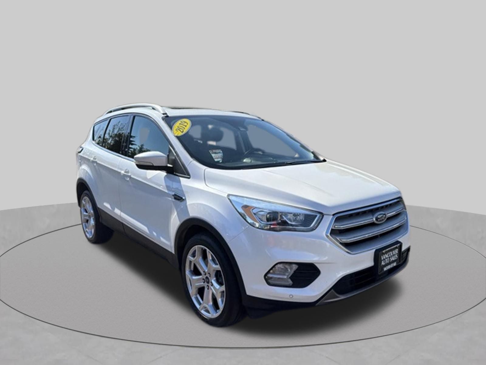 2019 Ford Escape Titanium in White Platinum Clearcoat Metallic — front three-quarter view