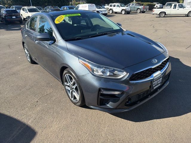 2019 Kia Forte S in Gravity Gray — front three-quarter view