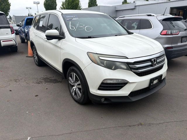 2017 Honda Pilot EX in White — front three-quarter view